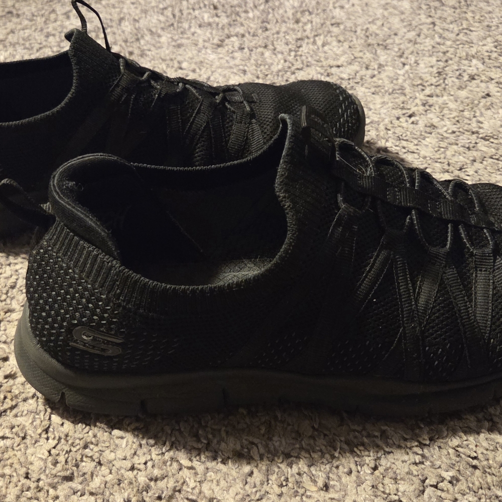 Skechers All-Black Knit Slip-On Sneakers